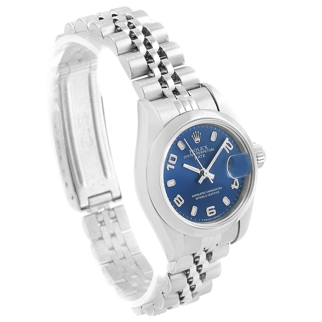 The Rolex Oyster Perpetual 79160 Women's Stainless Steel Blue Dial 79160 Women's Stainless Steel Blue Dial watch is shown at a slight angle, showcasing its blue dial, band, crown, and clasp.