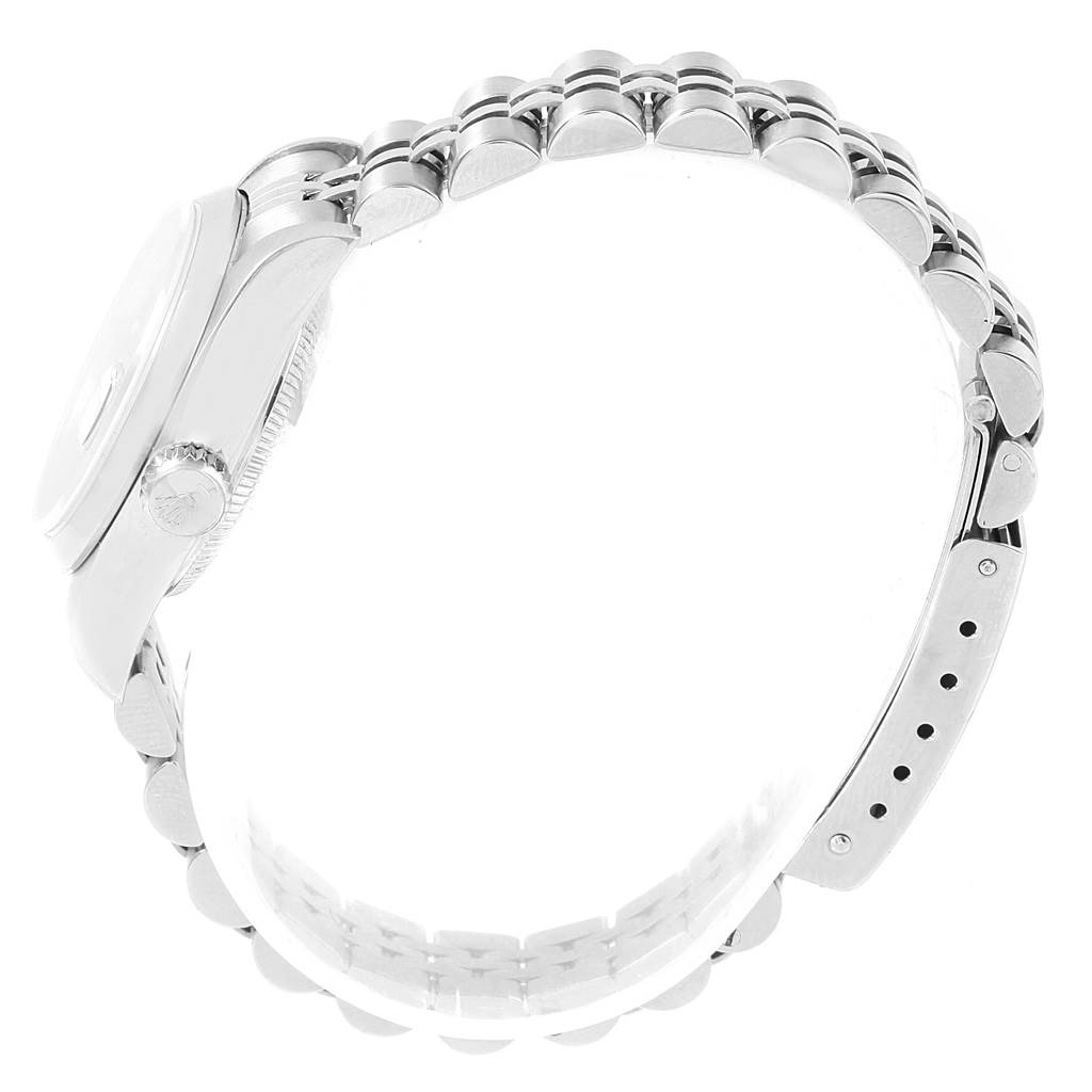 The image shows a side view of the case and band of a Rolex Oyster Perpetual 79160 Women's Stainless Steel Blue Dial 79160 Women's Stainless Steel Blue Dial watch.