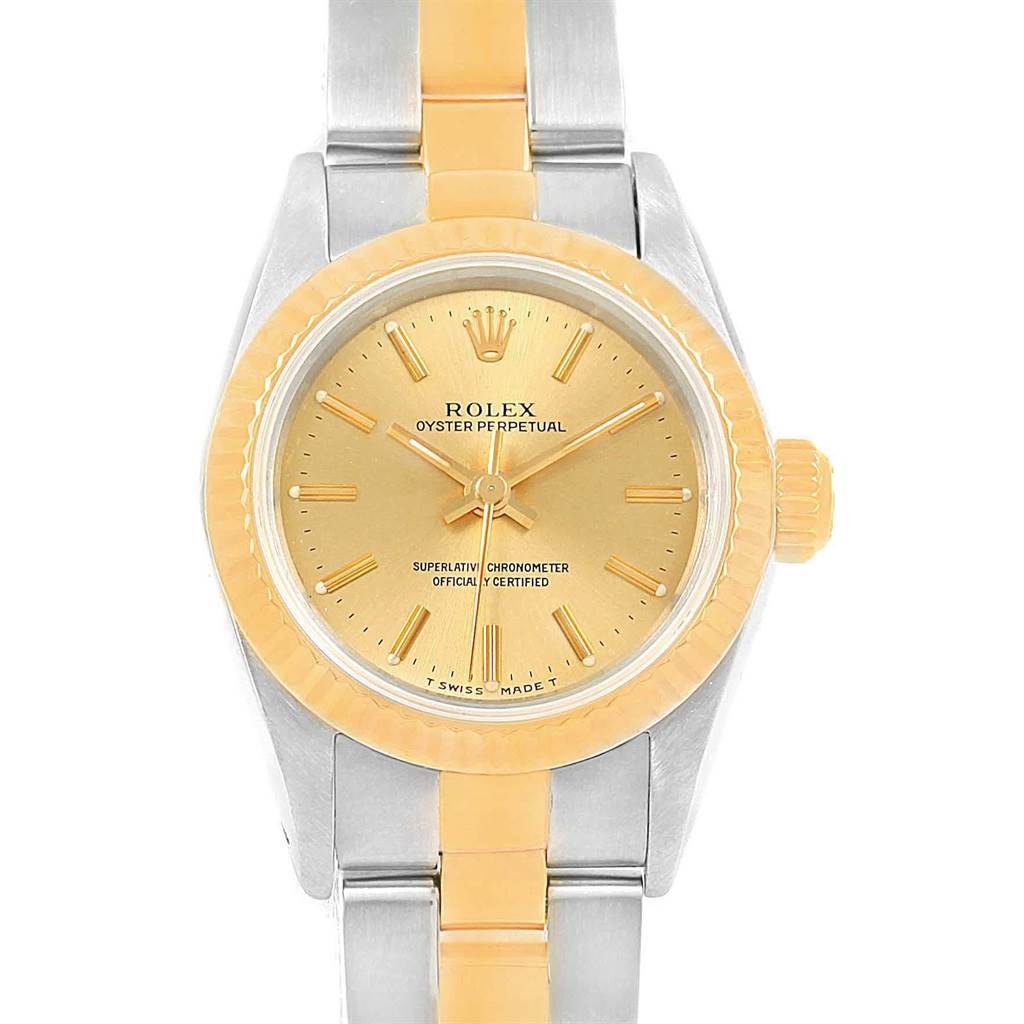 The Rolex Oyster Perpetual 67193 Women's Steel and Gold (two tone) Champagne Dial 67193 Women's Steel and Gold (two tone) Champagne Dial watch is shown from a front angle, highlighting the dial, bezel, and part of the bracelet.