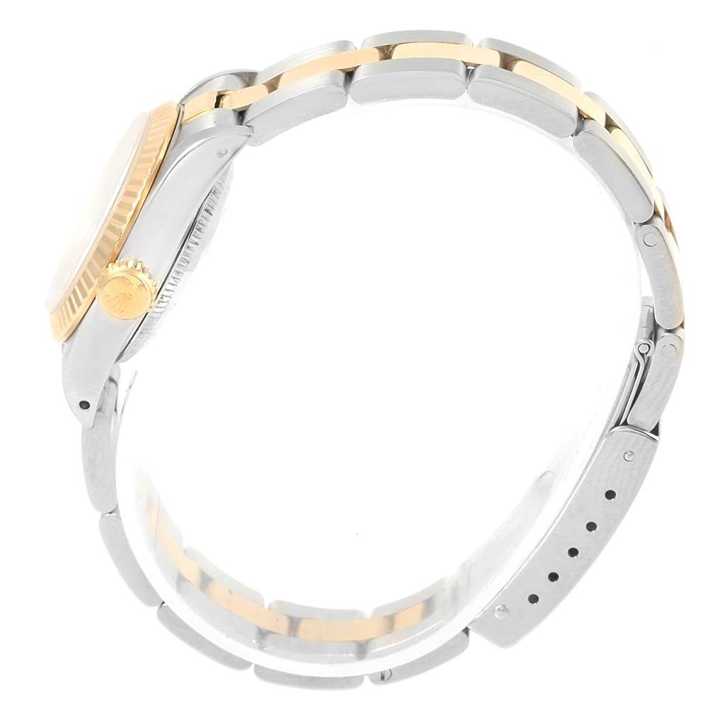 The image shows a side view of the Rolex Oyster Perpetual 67193 Women's Steel and Gold (two tone) Champagne Dial 67193 Women's Steel and Gold (two tone) Champagne Dial watch, focusing on the bracelet and side of the watch case.