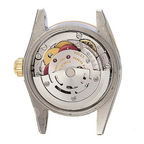 This image shows the back view of a Rolex Oyster Perpetual 76193 Women's Stainless Steel Silver Dial 76193 Women's Stainless Steel Silver Dial watch, highlighting the intricate mechanics and movement.