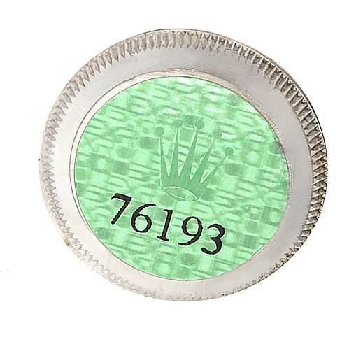This image shows the hologram sticker with the reference number 76193 for the Rolex Oyster Perpetual 76193 Women's Stainless Steel Silver Dial 76193 Women's Stainless Steel Silver Dial watch.