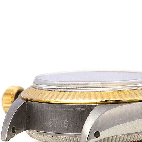 The image shows a close-up side view of the Rolex Oyster Perpetual 6719 Women's Stainless Steel Silver Dial 6719 Women's Stainless Steel Silver Dial watch, highlighting the case, bezel, and crown.