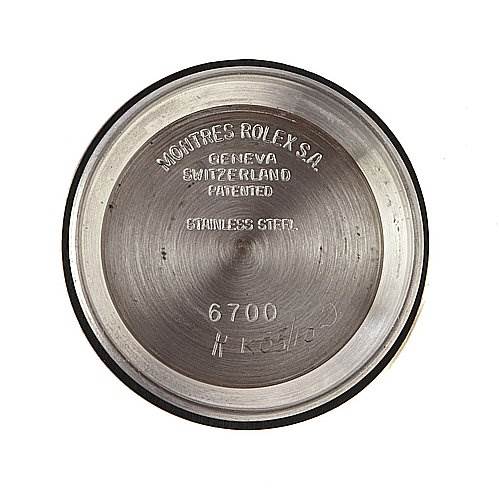 This is the case back interior of a Rolex Oyster Perpetual 6719 Women's Stainless Steel Silver Dial 6719 Women's Stainless Steel Silver Dial model, displaying the brand's inscription and "6700" model number.