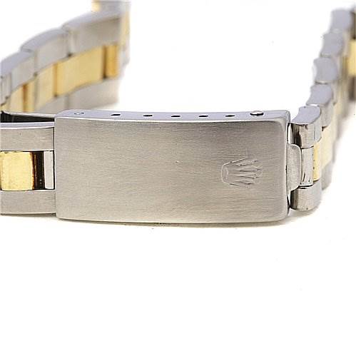 The image shows a close-up of the clasp and part of the bracelet of a Rolex Oyster Perpetual 6719 Women's Stainless Steel Silver Dial 6719 Women's Stainless Steel Silver Dial watch.