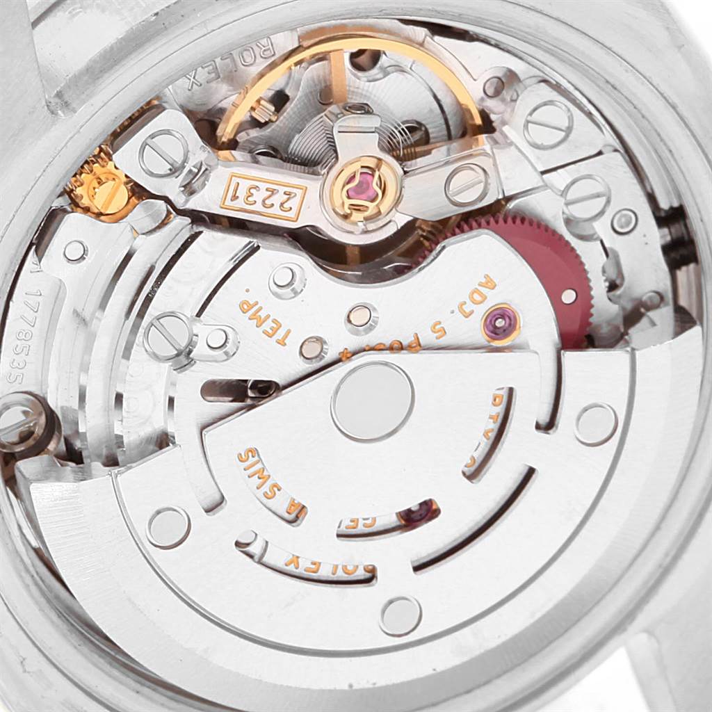 This image shows the movement mechanism of a Rolex Oyster Perpetual 176200 Women
s Stainless Steel Pink Dial 176200 Women
s Stainless Steel Pink Dial watch, specifically focusing on the intricate inner components.