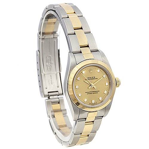 This image shows a Rolex Oyster Perpetual 76183 Women's Stainless Steel Champagne Dial 76183 Women's Stainless Steel Champagne Dial watch at a slight angle, displaying the face, bezel, crown, and bracelet.