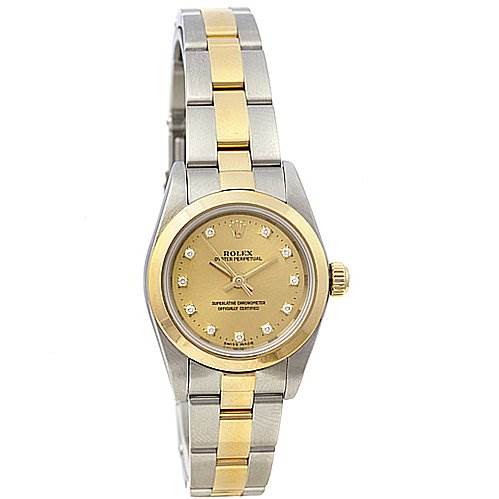 The image shows a front view of a Rolex Oyster Perpetual 76183 Women's Stainless Steel Champagne Dial 76183 Women's Stainless Steel Champagne Dial watch with a two-tone stainless steel and gold bracelet and a gold dial.