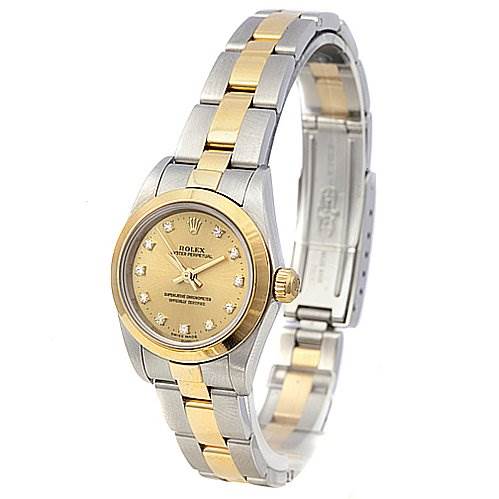 This image shows a Rolex Oyster Perpetual 76183 Women's Stainless Steel Champagne Dial 76183 Women's Stainless Steel Champagne Dial watch at a slight angle, highlighting the watch face, bezel, and bi-color metal bracelet.