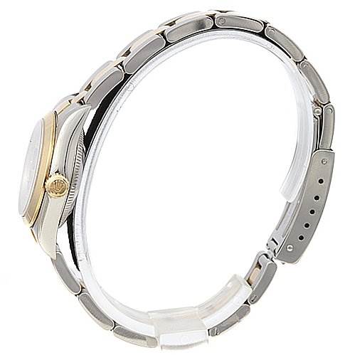 This is a side view of a Rolex Oyster Perpetual 76183 Women's Stainless Steel Champagne Dial 76183 Women's Stainless Steel Champagne Dial watch, showing the bracelet and the case.