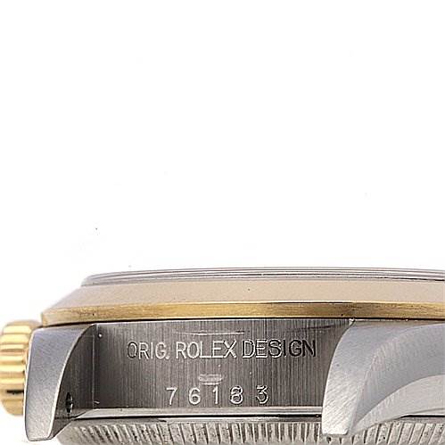 This image shows the side view of the Rolex Oyster Perpetual 76183 Women's Stainless Steel Champagne Dial 76183 Women's Stainless Steel Champagne Dial watch case with visible engravings and the crown.