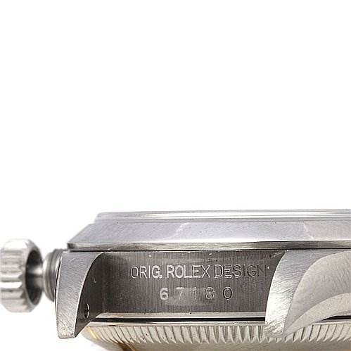 The image shows a side view of the case and crown of the Rolex Oyster Perpetual 67180 Women's Stainless Steel Blue Dial 67180 Women's Stainless Steel Blue Dial watch, highlighting the engraved model number.