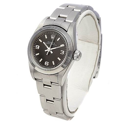 The Rolex Oyster Perpetual 67180 Women's Stainless Steel Black Dial 67180 Women's Stainless Steel Black Dial watch is shown from a slight angle, highlighting its face, bezel, bracelet, and crown.