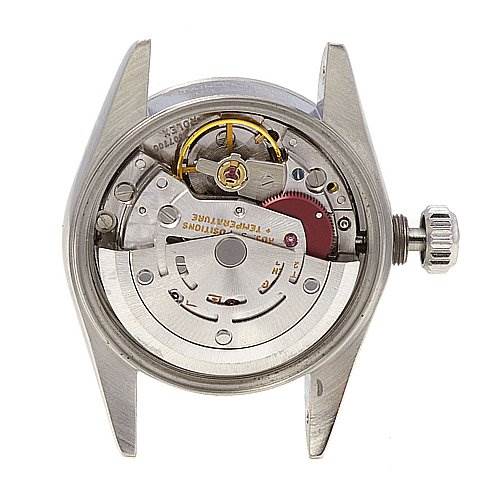 The image shows the inner mechanism and movement of a Rolex Oyster Perpetual 67180 Women's Stainless Steel Black Dial 67180 Women's Stainless Steel Black Dial watch viewed from the back.