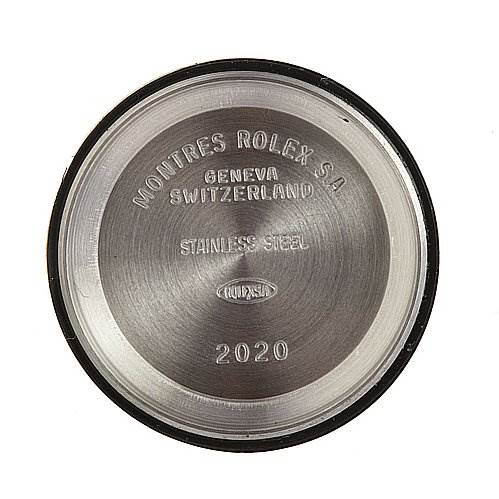 This image shows the back case of a Rolex Oyster Perpetual 67180 Women's Stainless Steel Black Dial 67180 Women's Stainless Steel Black Dial watch, highlighting its stainless steel construction and engravings.