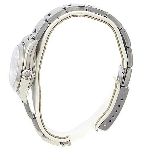 This image shows the side profile of a Rolex Oyster Perpetual 76080 Women's Stainless Steel Silver Dial 76080 Women's Stainless Steel Silver Dial watch, highlighting the crown, case, and bracelet.