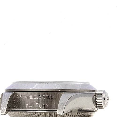 The image shows a side view of a Rolex Oyster Perpetual 76080 Women's Stainless Steel Silver Dial 76080 Women's Stainless Steel Silver Dial watch, focusing on the crown, case, and part of the bezel.