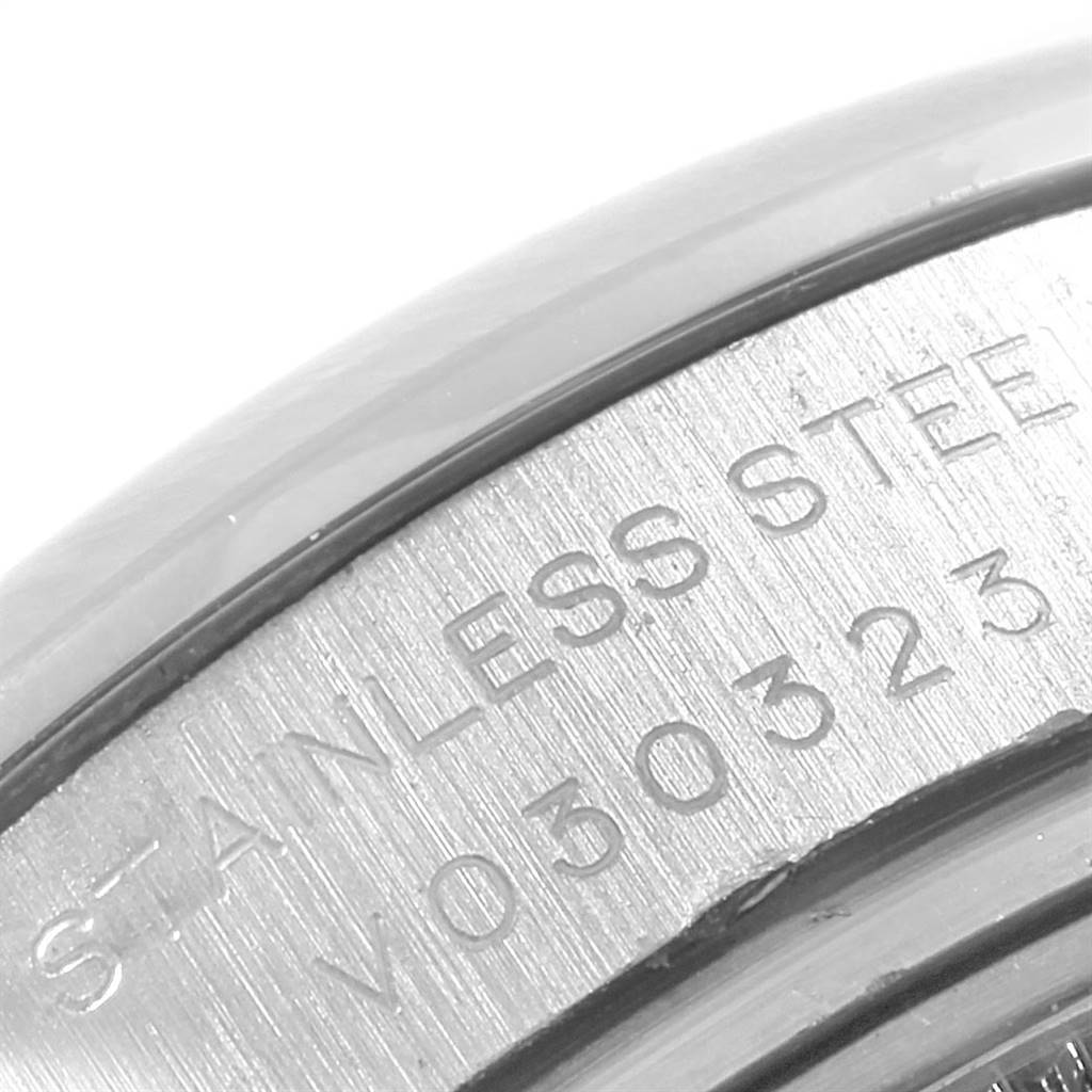 The image shows a close-up of the side case of a Rolex Oyster Perpetual 176200 Women
s Stainless Steel Black Dial 176200 Women
s Stainless Steel Black Dial watch, highlighting the engraved text.