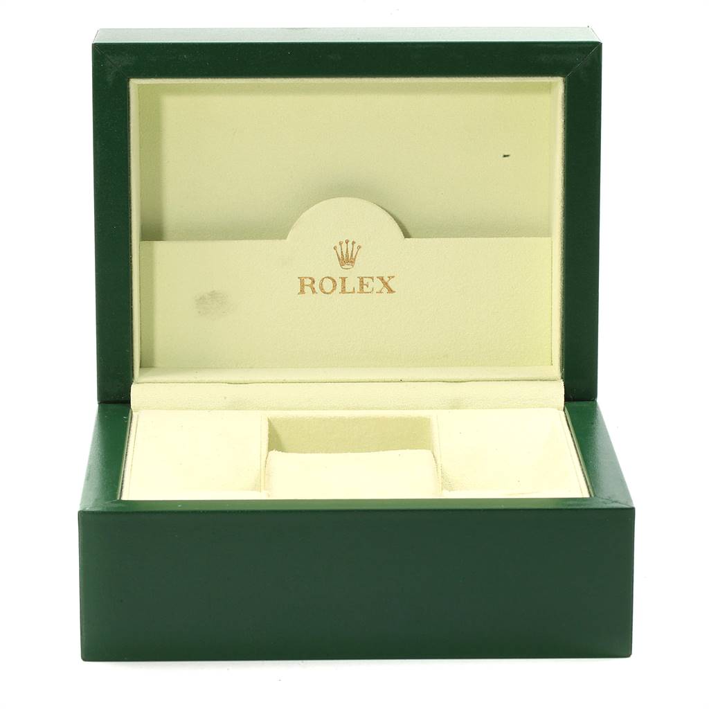This image shows an open green and beige box for the Rolex Oyster Perpetual 176200 Women
s Stainless Steel Black Dial 176200 Women
s Stainless Steel Black Dial watch.