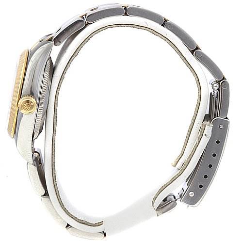 The image shows a side view of a Rolex Oyster Perpetual 76193 Women's Stainless Steel Silver Dial 76193 Women's Stainless Steel Silver Dial watch displaying the crown, bezel, and bracelet.