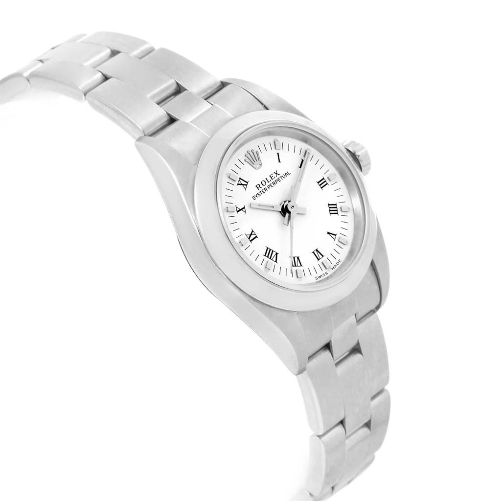 The image shows a Rolex Oyster Perpetual 76080 Women's Stainless Steel White Dial 76080 Women's Stainless Steel White Dial watch at a three-quarter angle, displaying the dial, bezel, crown, and part of the metal bracelet.