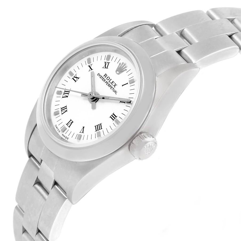 This image shows a side-angle view of a Rolex Oyster Perpetual 76080 Women's Stainless Steel White Dial 76080 Women's Stainless Steel White Dial watch displaying its bezel, dial, bracelet, and crown.