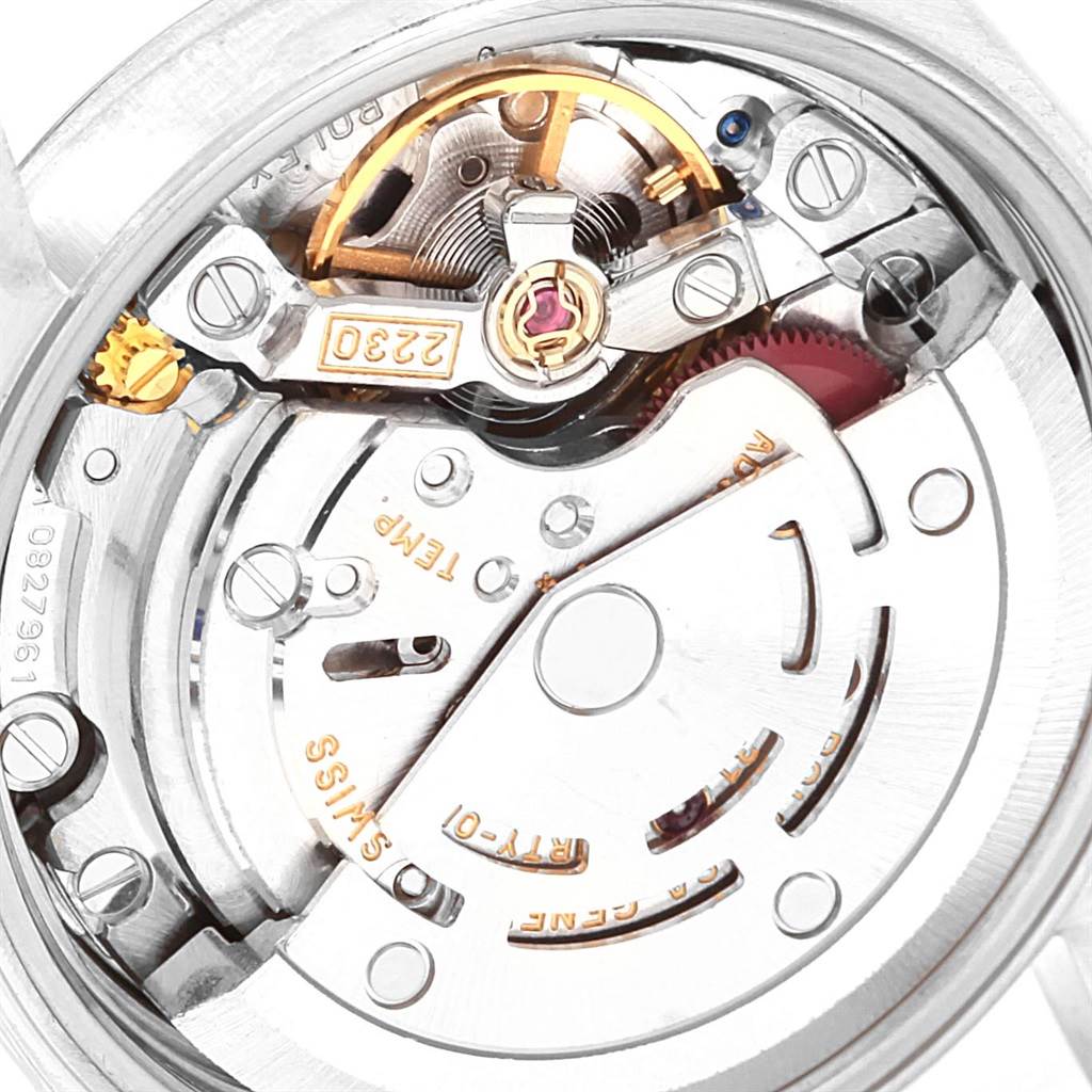 This is a close-up view of the movement of a Rolex Oyster Perpetual 76080 Women
s Stainless Steel Silver Dial 76080 Women
s Stainless Steel Silver Dial watch, showcasing its internal mechanical components.