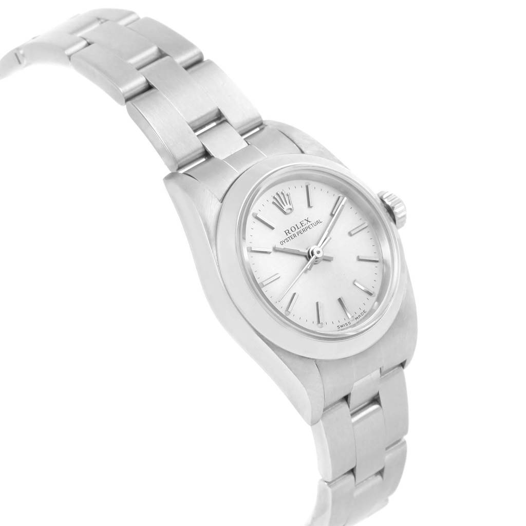 The Rolex Oyster Perpetual 76080 Women
s Stainless Steel Silver Dial 76080 Women
s Stainless Steel Silver Dial watch is shown at a slight angle, highlighting the bracelet, case, dial, and crown.