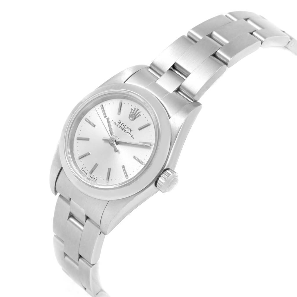 The Rolex Oyster Perpetual 76080 Women
s Stainless Steel Silver Dial 76080 Women
s Stainless Steel Silver Dial watch is shown from a front angle, highlighting its face, dial, and bracelet.