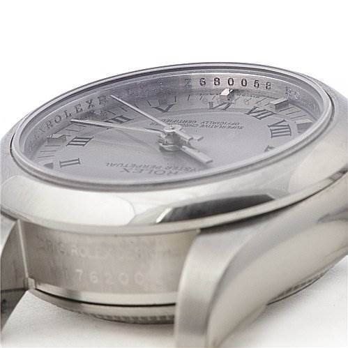 The image shows a side angle of a Rolex Oyster Perpetual 176200 Women's Stainless Steel Silver Dial 176200 Women's Stainless Steel Silver Dial watch, featuring its dial, case, and part of the bracelet.