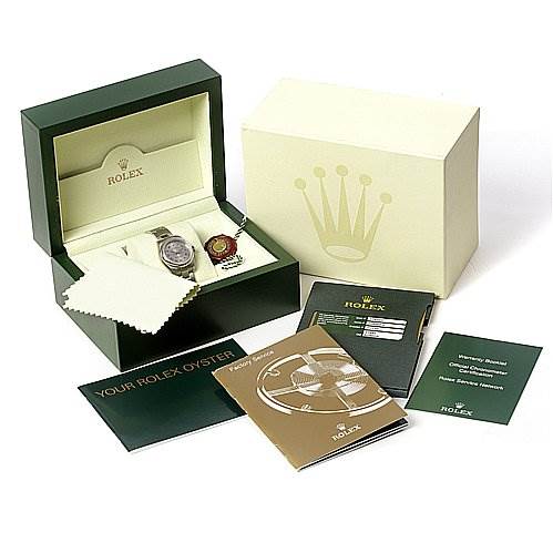 The image shows a Rolex Oyster Perpetual 176200 Women's Stainless Steel Silver Dial 176200 Women's Stainless Steel Silver Dial watch in its open box, along with several manuals and a warranty card.