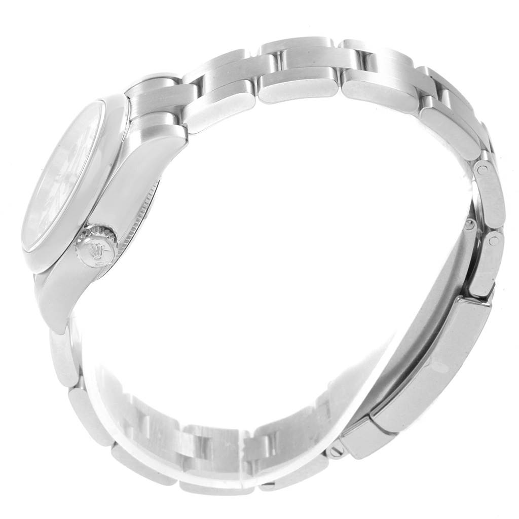 The image shows a side angle of the Rolex Oyster Perpetual 176200 Women
s Stainless Steel White Dial 176200 Women
s Stainless Steel White Dial, highlighting its case, crown, and part of the bracelet.