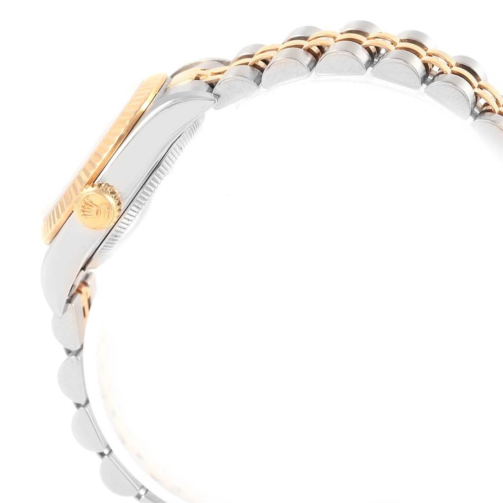 The image shows a side view of a Rolex Oyster Perpetual 67193 Women's Steel and Gold (two tone) Grey Dial 67193 Women's Steel and Gold (two tone) Grey Dial watch, focusing on the crown and a portion of the bracelet.