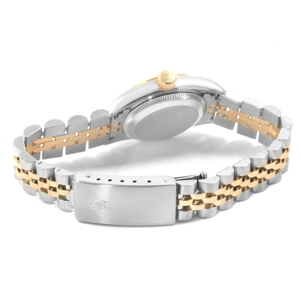 The image shows the back and bracelet of a Rolex Oyster Perpetual 67193 Women's Steel and Gold (two tone) Grey Dial 67193 Women's Steel and Gold (two tone) Grey Dial watch at an angle.