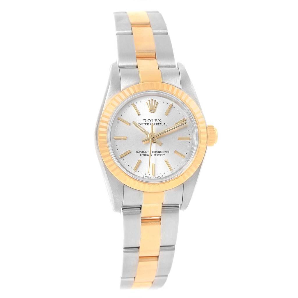 The Rolex Oyster Perpetual 76193 Women's Steel and Gold (two tone) Silver Dial 76193 Women's Steel and Gold (two tone) Silver Dial watch is shown from a front angle, displaying the dial, bezel, and two-tone bracelet.