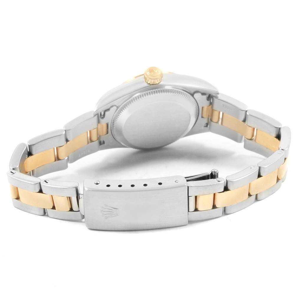 The image shows the back and bracelet of a Rolex Oyster Perpetual 76193 Women's Steel and Gold (two tone) Silver Dial 76193 Women's Steel and Gold (two tone) Silver Dial watch, highlighting the clasp and case back.