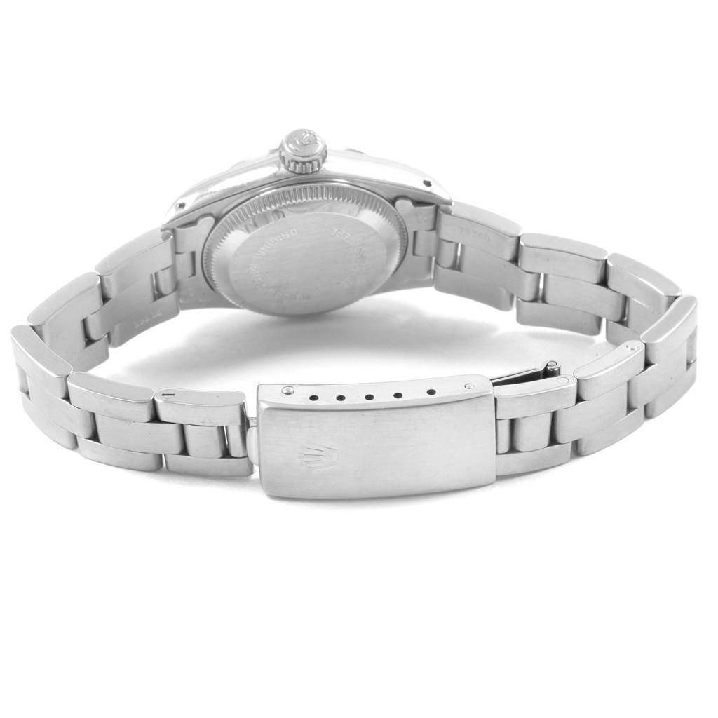 The image shows the back view of a Rolex Oyster Perpetual 67180 Women's Stainless Steel White Dial 67180 Women's Stainless Steel White Dial watch, highlighting its case back, crown, and bracelet clasp.