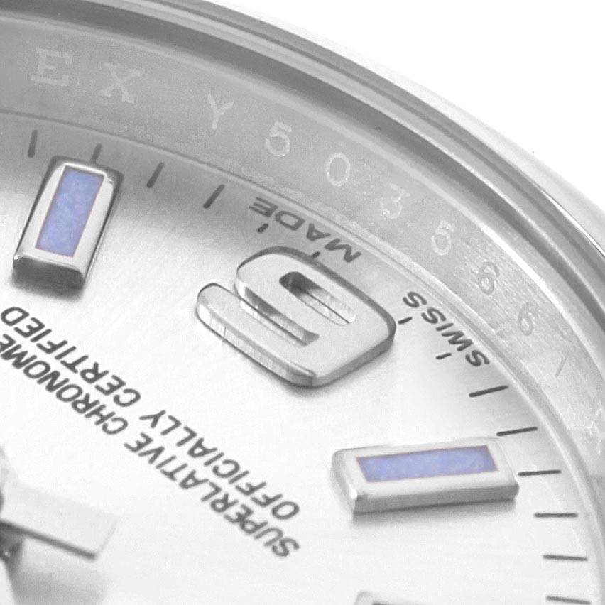 The image shows a close-up of the dial and part of the bezel on a Rolex Oyster Perpetual 176200 Women's Stainless Steel Silver Dial 176200 Women's Stainless Steel Silver Dial watch.