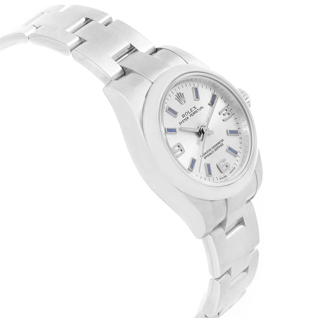 The image shows a side angle of the Rolex Oyster Perpetual 176200 Women's Stainless Steel Silver Dial 176200 Women's Stainless Steel Silver Dial watch, displaying its face, bezel, and part of the bracelet.