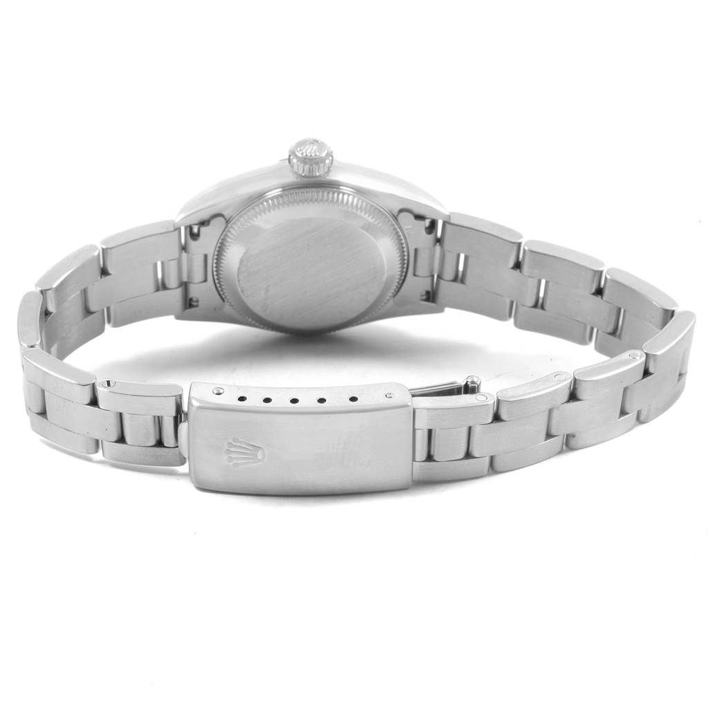 This image shows a rear view of the Rolex Oyster Perpetual 67180 Women's Stainless Steel Blue Dial 67180 Women's Stainless Steel Blue Dial watch, displaying the case back and bracelet clasp.