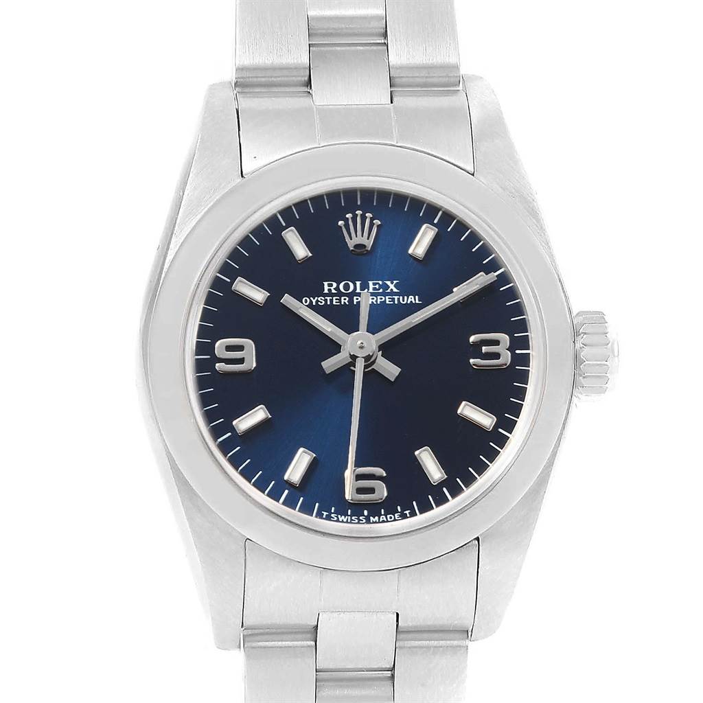 The image shows a front view of a Rolex Oyster Perpetual 67180 Women's Stainless Steel Blue Dial 67180 Women's Stainless Steel Blue Dial watch, displaying its blue dial and stainless steel bracelet.