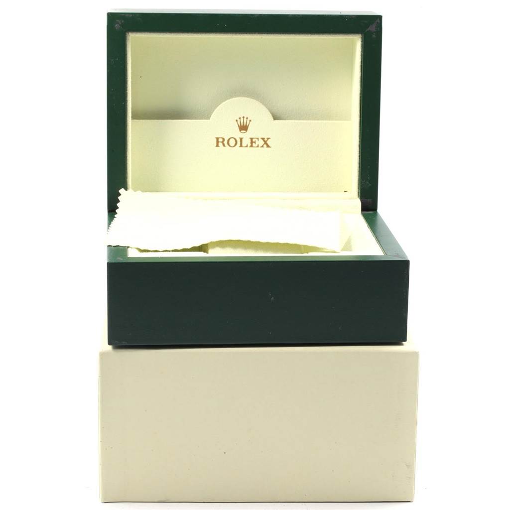 The image shows an open box for a Rolex Oyster Perpetual 176234 Women's Stainless Steel  176234 Women's Stainless Steel  watch, revealing the interior and a cleaning cloth inside.