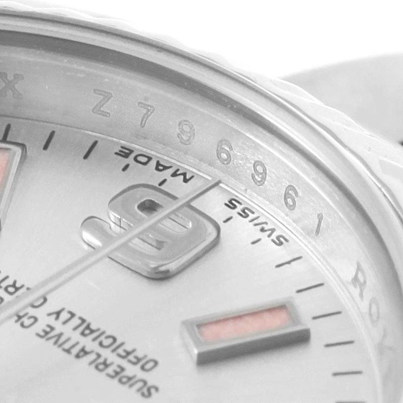 The image shows a close-up of the dial and serial number engraving of a Rolex Oyster Perpetual 176234 Women's Stainless Steel  176234 Women's Stainless Steel  watch.