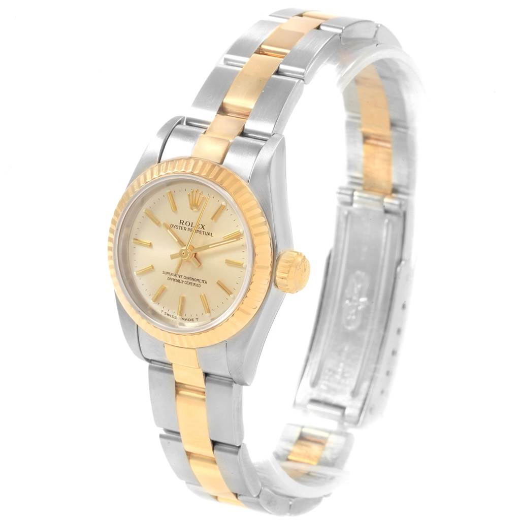 The Rolex Oyster Perpetual 67193 Women's Steel and Gold (two tone) Silver Dial 67193 Women's Steel and Gold (two tone) Silver Dial watch is shown at a slight angle highlighting the face, bezel, crown, and part of the bracelet.