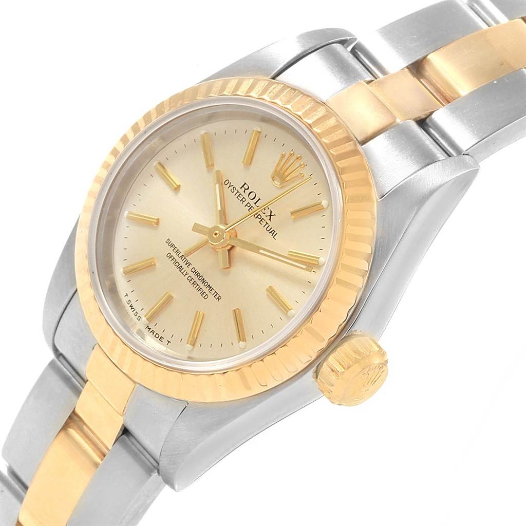 The image shows a close-up angled view of a Rolex Oyster Perpetual 67193 Women's Steel and Gold (two tone) Silver Dial 67193 Women's Steel and Gold (two tone) Silver Dial watch, highlighting its dial, bezel, crown, and part of the bracelet.
