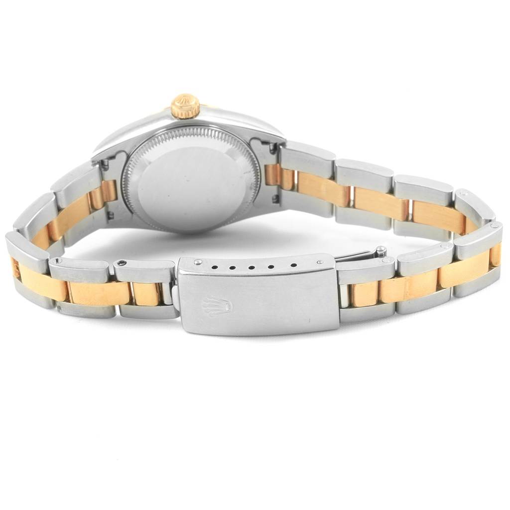 This image shows the back of the Rolex Oyster Perpetual 76193 Women's Steel and Gold (two tone) White Dial 76193 Women's Steel and Gold (two tone) White Dial watch, focusing on the clasp and bracelet in a gold and silver combination.