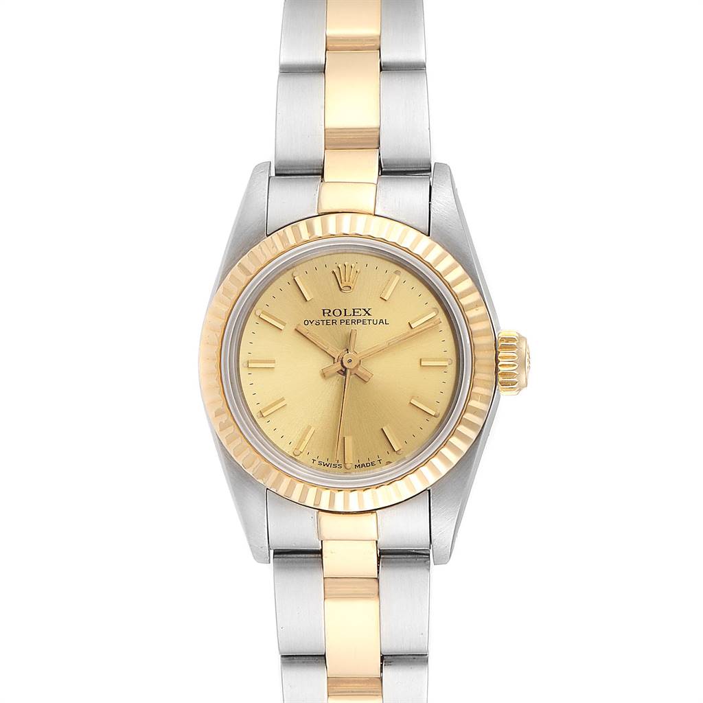 This image shows a front view of a Rolex Oyster Perpetual 67193 Women
s Steel and Gold (two tone) Champagne Dial 67193 Women
s Steel and Gold (two tone) Champagne Dial watch, displaying its gold dial, bezel, and two-tone stainless steel and gold bracelet.