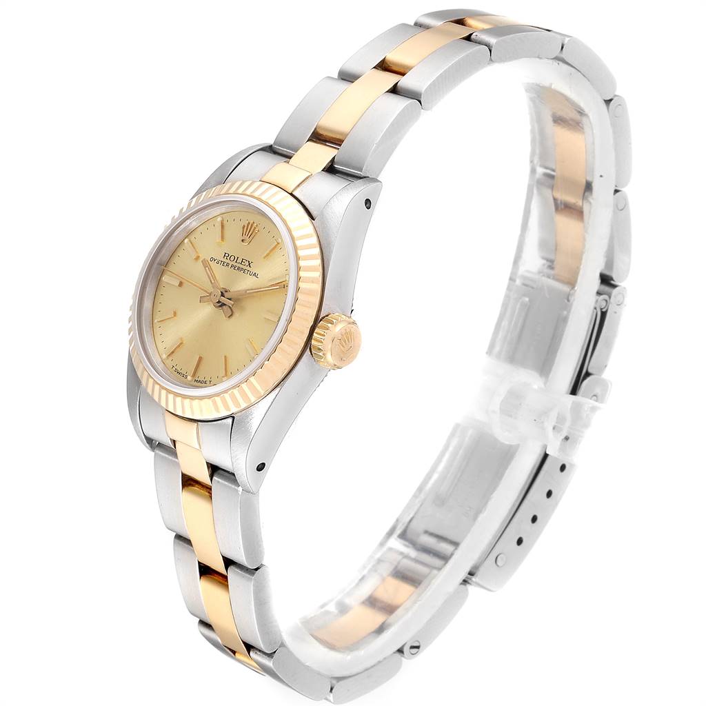 The image shows a side and front view of a Rolex Oyster Perpetual 67193 Women
s Steel and Gold (two tone) Champagne Dial 67193 Women
s Steel and Gold (two tone) Champagne Dial watch, highlighting the bezel, dial, and bracelet.