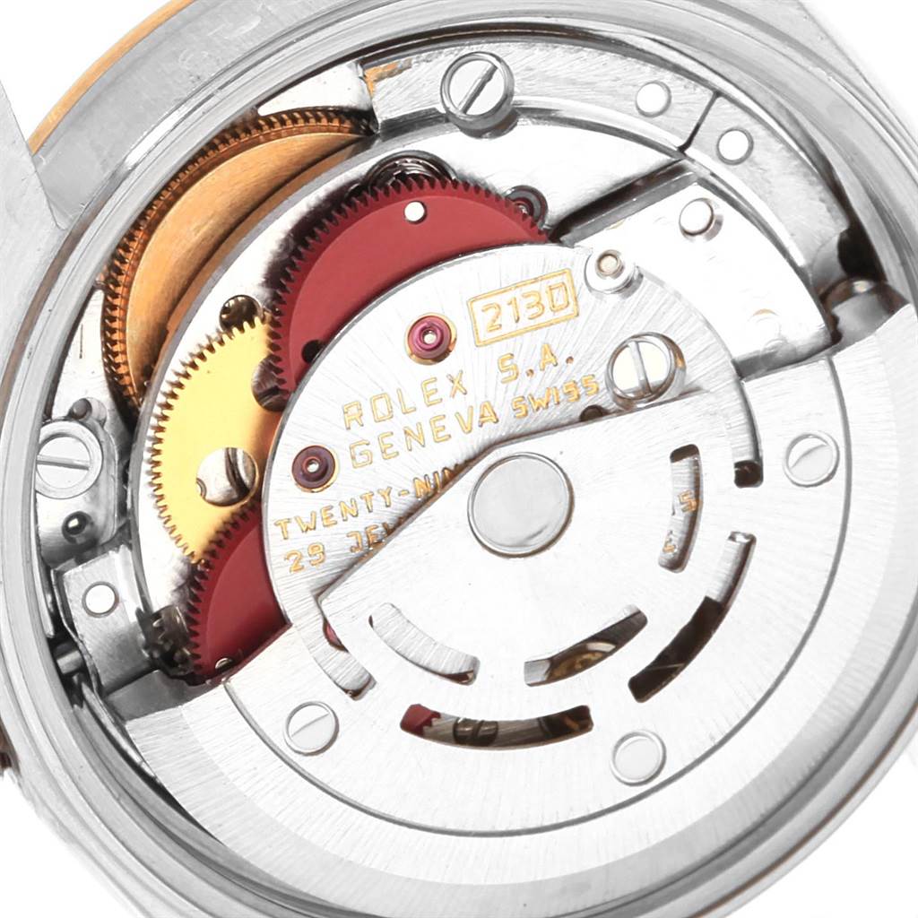 The image shows the inner mechanical movement of a Rolex Oyster Perpetual 67193 Women's Steel and Gold (two tone) Champagne Dial 67193 Women's Steel and Gold (two tone) Champagne Dial watch, viewed from the back.
