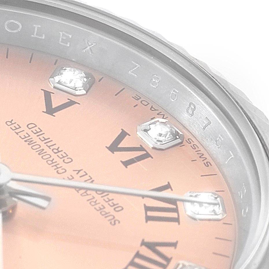 The image shows a close-up angle of the dial and part of the bezel of a Rolex Oyster Perpetual 176234 Women's Stainless Steel Pink Dial 176234 Women's Stainless Steel Pink Dial watch.